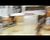 Justin Popelka drives to the hoop and scores