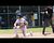 Manitowoc's Trent Van Ess squeezes home a run