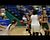 NMU Makaylee Kuhn with the basket; gets injured on the play