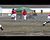 Escanaba's Bailey Lamb with a good bunt.